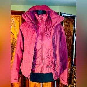 Marmot detailed removable hood and vest ski jacket.